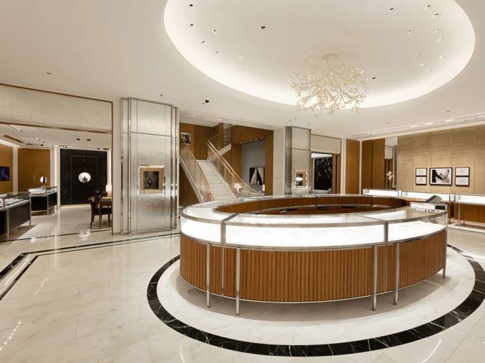 A look at a large round display case at the center of a Tiffany & Co. store