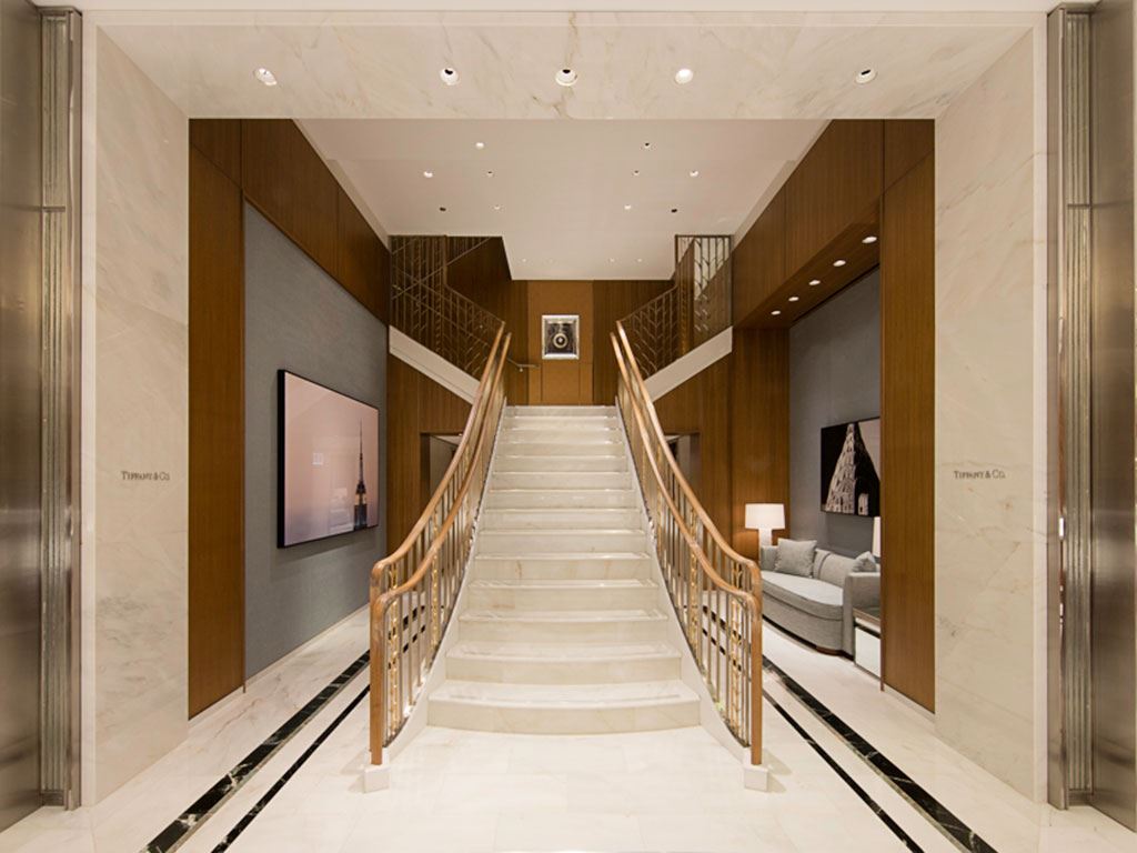 Stairs leading up to the second floor of a Tiffany & Co. store